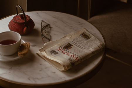 Newspaper on coffee table
